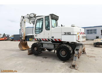 Excavadora de ruedas Liebherr A 316 Litronic: foto 3