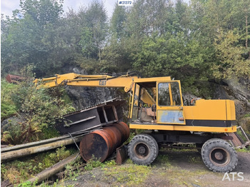Excavadora de ruedas CATERPILLAR