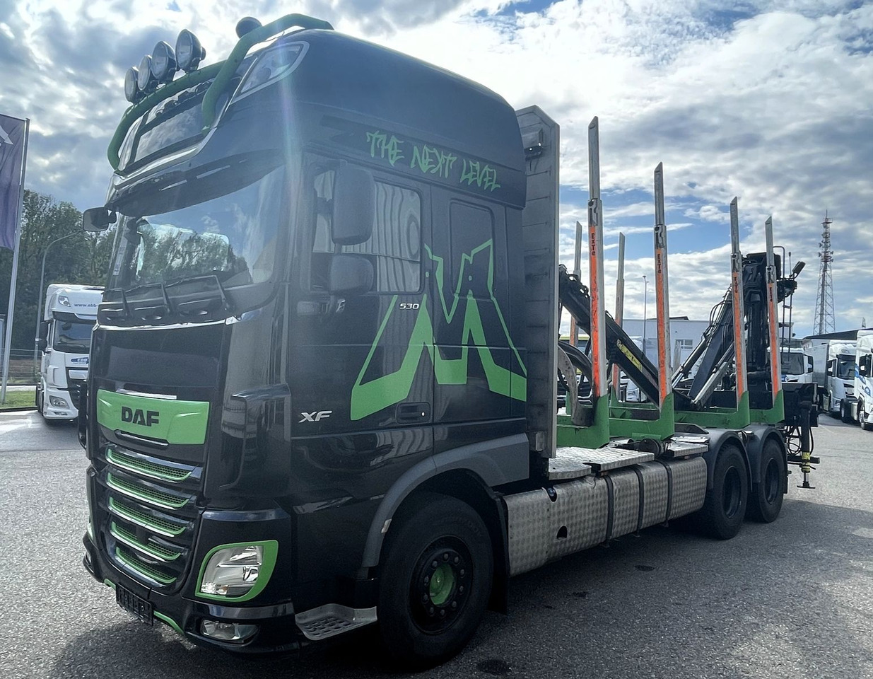 DAF FAT XF 530 SSC, Holztransport, Greifer mit Säge - Camión forestal, Camión grúa: foto 2 DAF FAT XF 530 SSC, Holztransport, Greifer mit Säge - Camión forestal, Camión grúa: foto 2