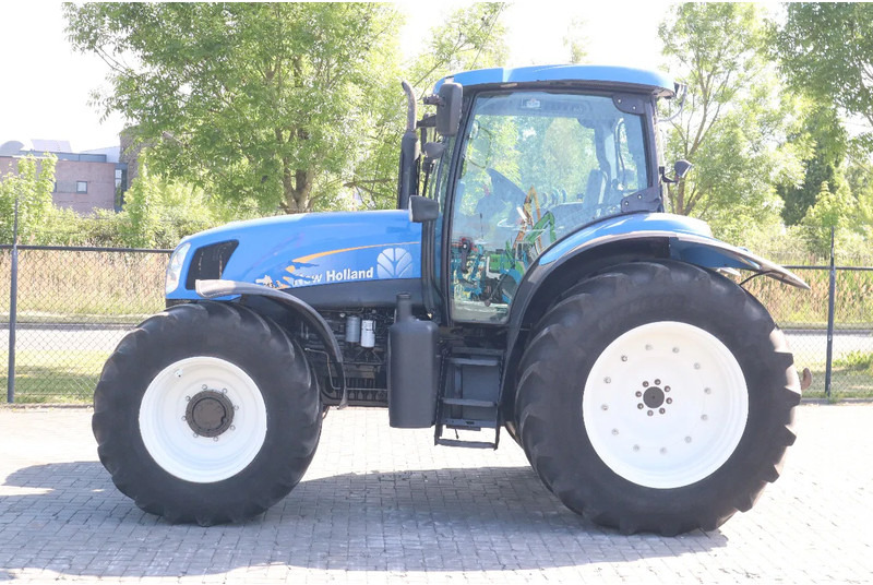 New Holland TS135A | 40 KM/H | 4X4 | SUPERSTEER - Tractor: foto 1 New Holland TS135A | 40 KM/H | 4X4 | SUPERSTEER - Tractor: foto 1