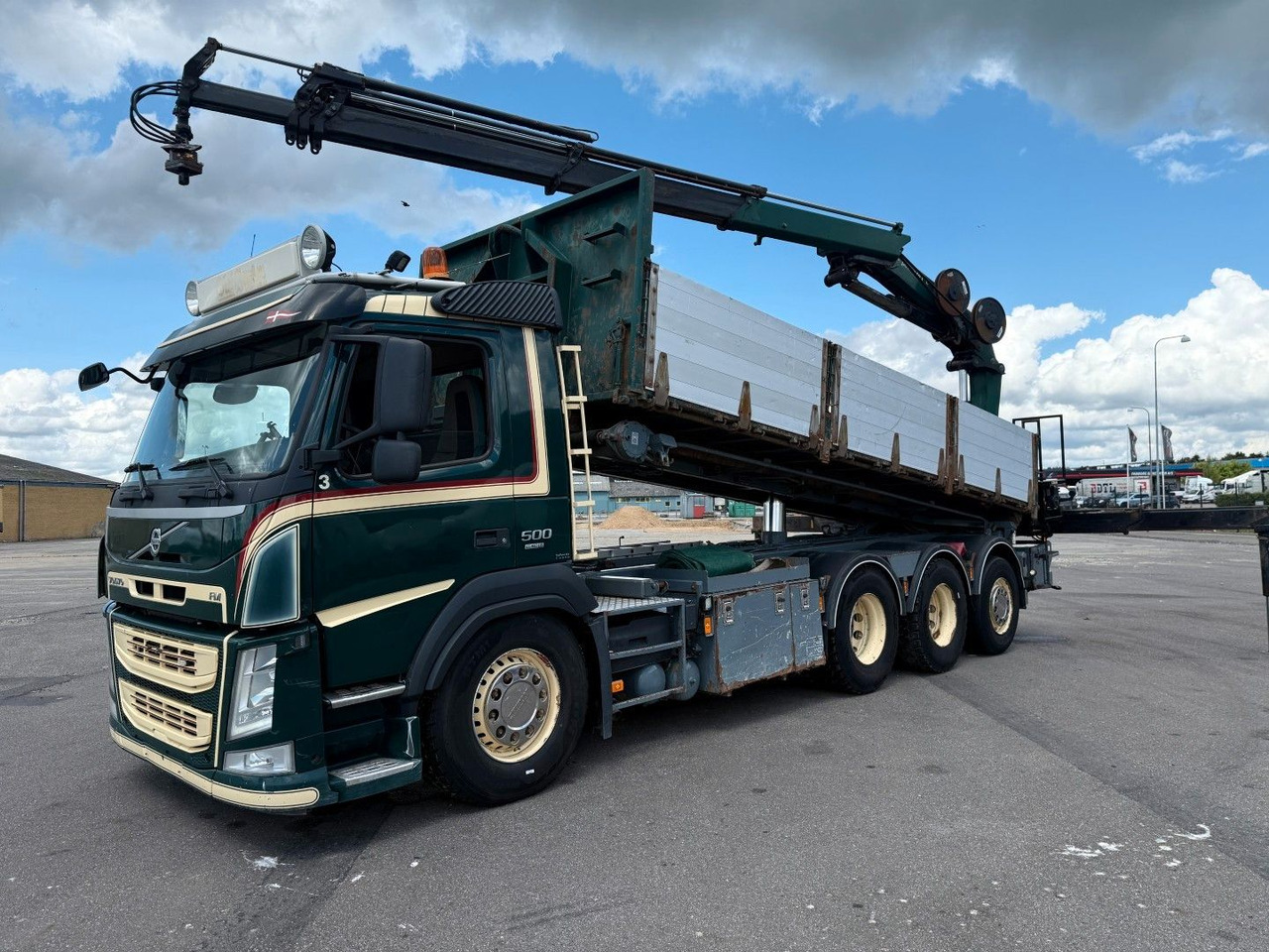 Volvo FM500 8x4*4 Tipper / Crane HMF2620-K5 - Camión volquete, Camión grúa: foto 1 Volvo FM500 8x4*4 Tipper / Crane HMF2620-K5 - Camión volquete, Camión grúa: foto 1