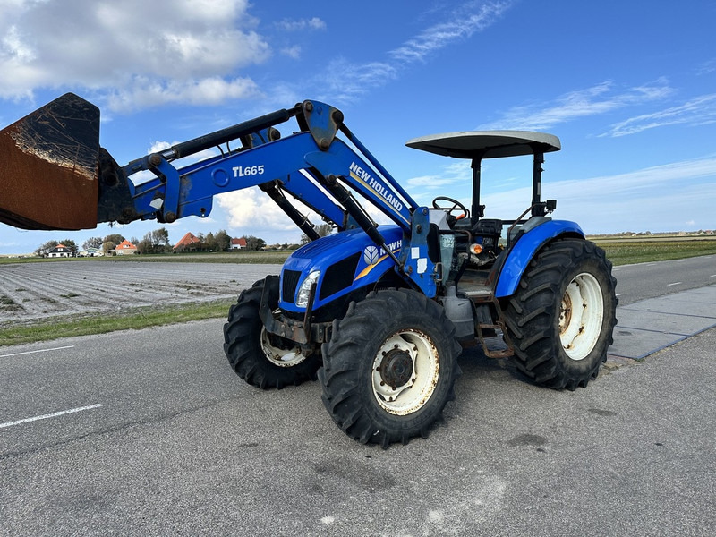 New Holland TD5.100 - Tractor: foto 1 New Holland TD5.100 - Tractor: foto 1