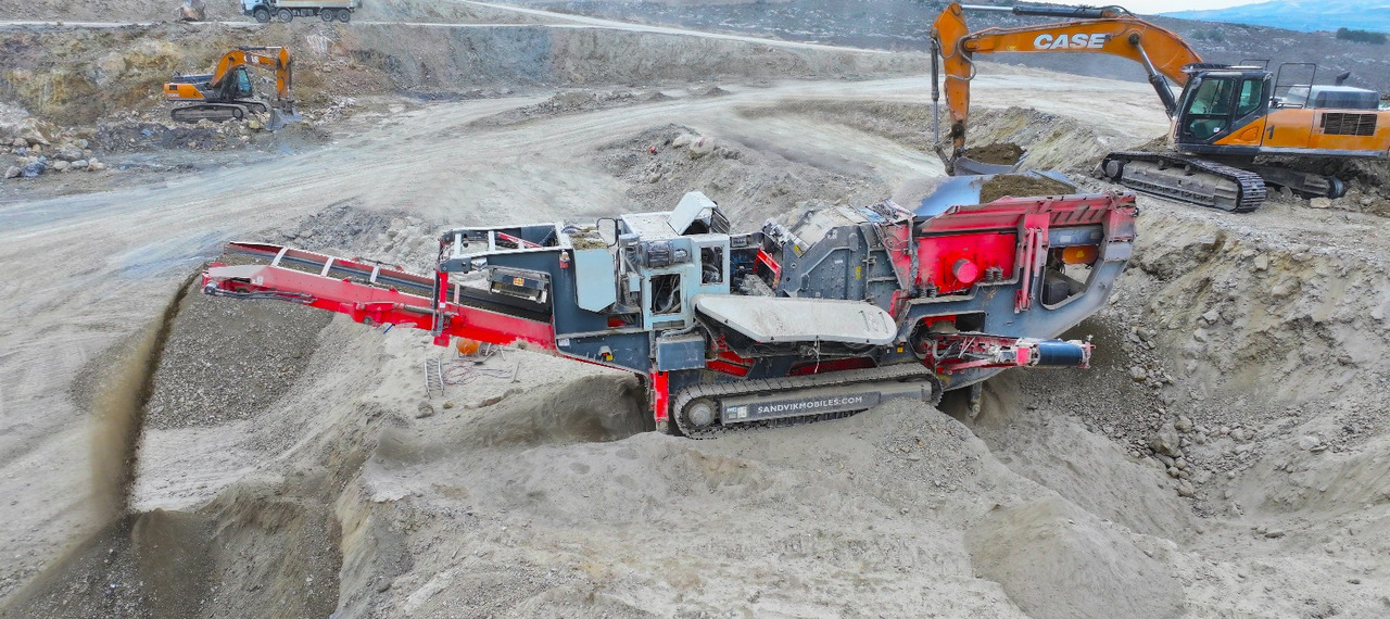 FABO USED SANDVIK MOBILE CRAWLER 140 PDK CRUSHER - Trituradora móvil: foto 1 FABO USED SANDVIK MOBILE CRAWLER 140 PDK CRUSHER - Trituradora móvil: foto 1