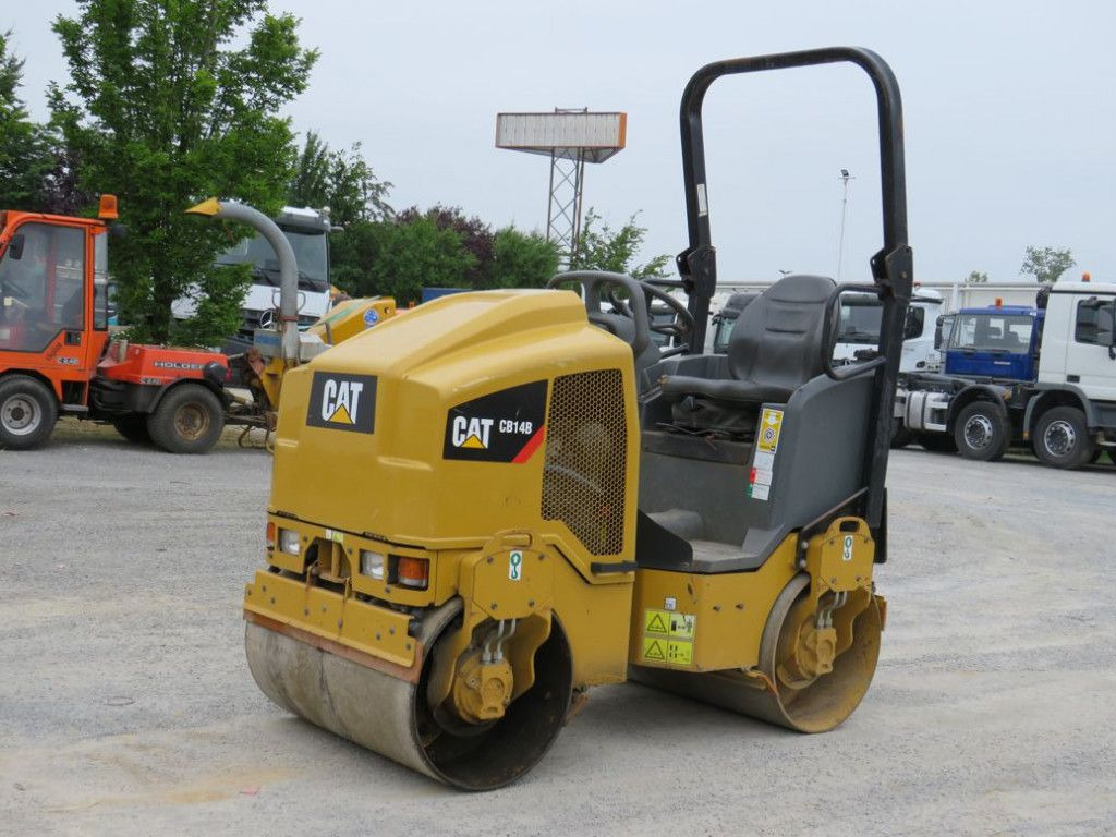 CAT Tandem-Vibrationswalze CB14 B Baumaschine - Rodillo: foto 1 CAT Tandem-Vibrationswalze CB14 B Baumaschine - Rodillo: foto 1