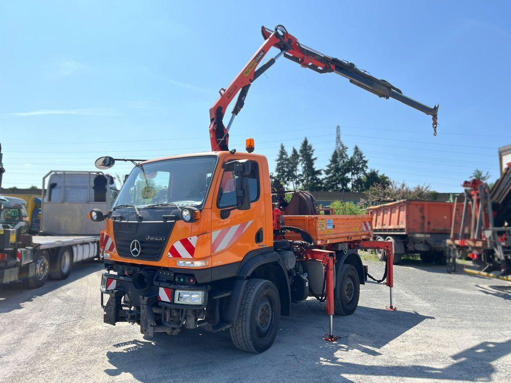 Mercedes-Benz Unimog U20 2-Achs Allradkipper Kran Palfinger Kr - Camión volquete, Camión grúa: foto 1 Mercedes-Benz Unimog U20 2-Achs Allradkipper Kran Palfinger Kr - Camión volquete, Camión grúa: foto 1