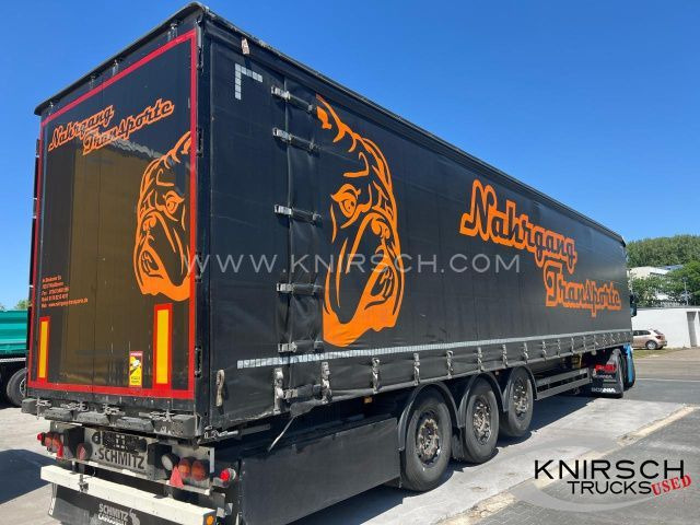 Schmitz Cargobull XL, Heckportal verbreiterbar, 1 + 3 Achselift - Semirremolque lona: foto 1 Schmitz Cargobull XL, Heckportal verbreiterbar, 1 + 3 Achselift - Semirremolque lona: foto 1