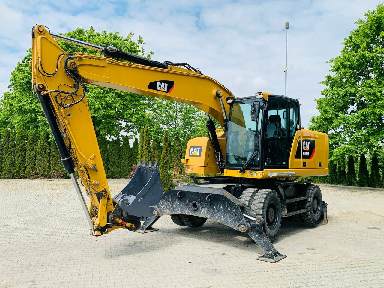 CAT M318F Mobilbagger *5.845 h *Schnellwechsel - Excavadora de ruedas: foto 1 CAT M318F Mobilbagger *5.845 h *Schnellwechsel - Excavadora de ruedas: foto 1
