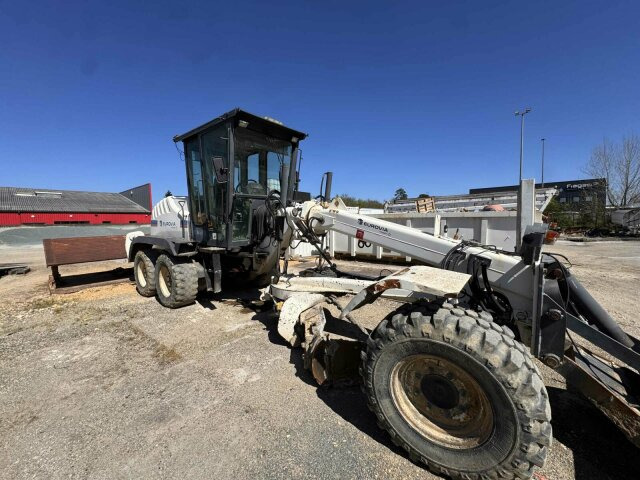 New Holland F106.6A alrrad 6x6 Grader 12 Ton - 10.700 Std - Grader: foto 1 New Holland F106.6A alrrad 6x6 Grader 12 Ton - 10.700 Std - Grader: foto 1