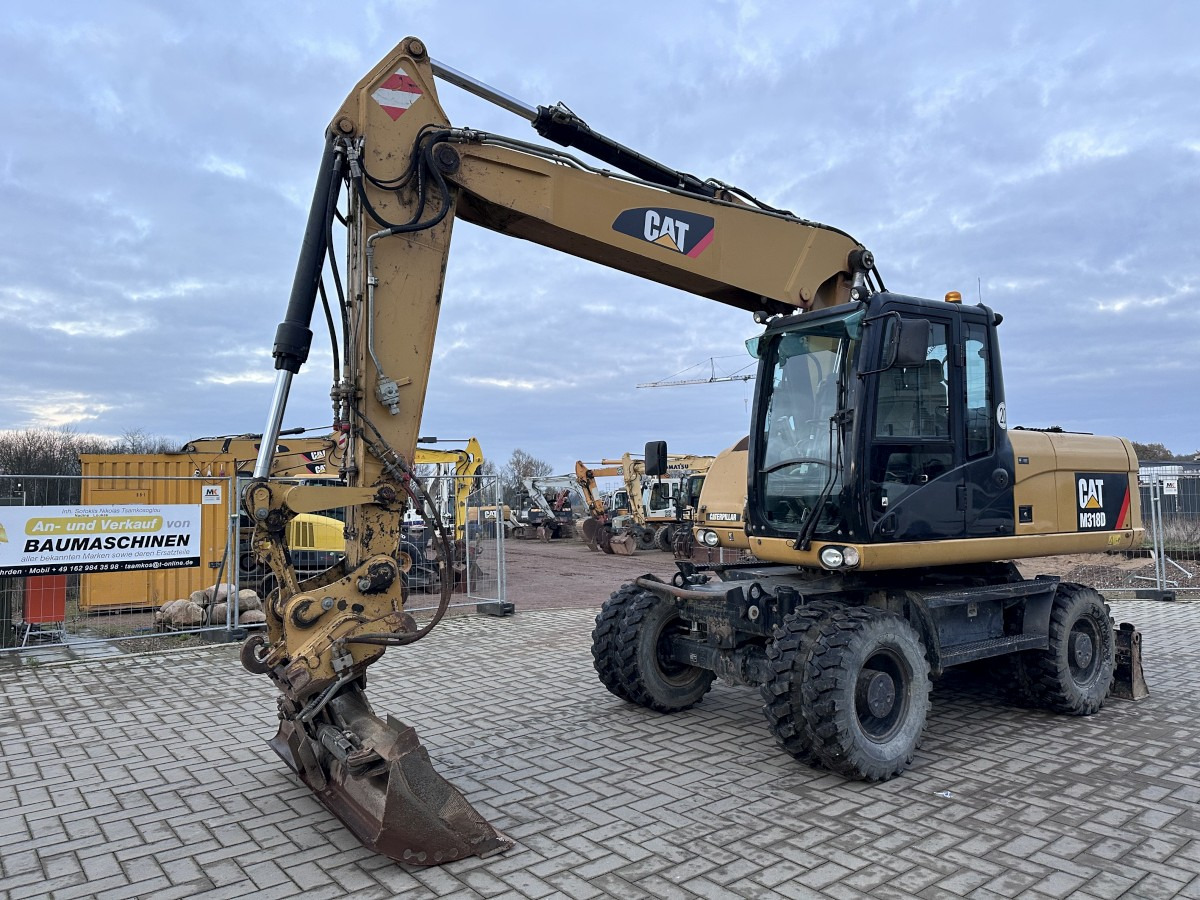 CATERPILLAR M 318 D full Hydr. Top Zustand German machine ! - Excavadora de ruedas: foto 4 CATERPILLAR M 318 D full Hydr. Top Zustand German machine ! - Excavadora de ruedas: foto 4