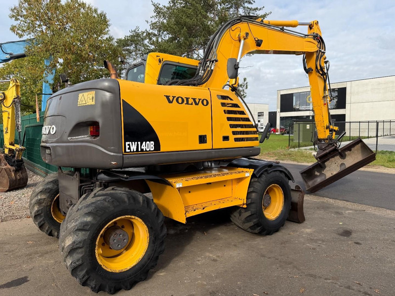 Volvo EW 140 B *FULL HYDR* - BLADE - 10.485h - TILT BUCKET -  CE - NL MACHINE - GOOD CONDITION - Excavadora de ruedas: foto 3 Volvo EW 140 B *FULL HYDR* - BLADE - 10.485h - TILT BUCKET -  CE - NL MACHINE - GOOD CONDITION - Excavadora de ruedas: foto 3