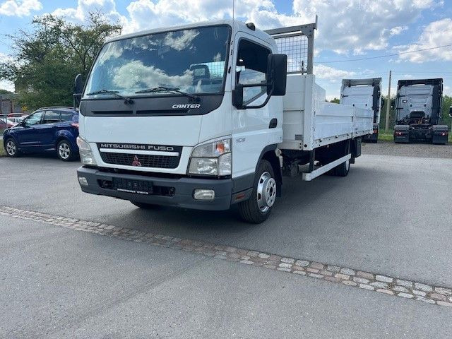 Mitsubishi Canter FE 85 Pritschenwagen - Camión caja abierta: foto 1 Mitsubishi Canter FE 85 Pritschenwagen - Camión caja abierta: foto 1