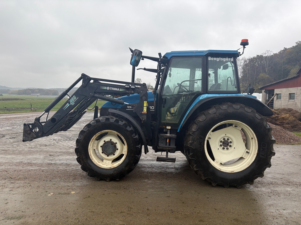 New Holland TS110 - Tractor: foto 1 New Holland TS110 - Tractor: foto 1