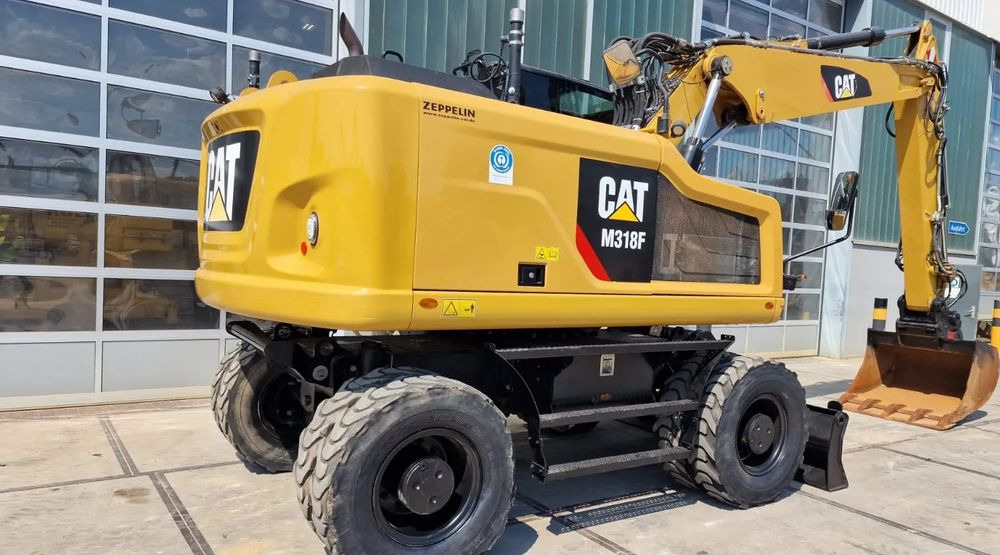 Caterpillar M318F, 2019 ROK, IMPORT NIEMCY - Excavadora de ruedas: foto 1 Caterpillar M318F, 2019 ROK, IMPORT NIEMCY - Excavadora de ruedas: foto 1