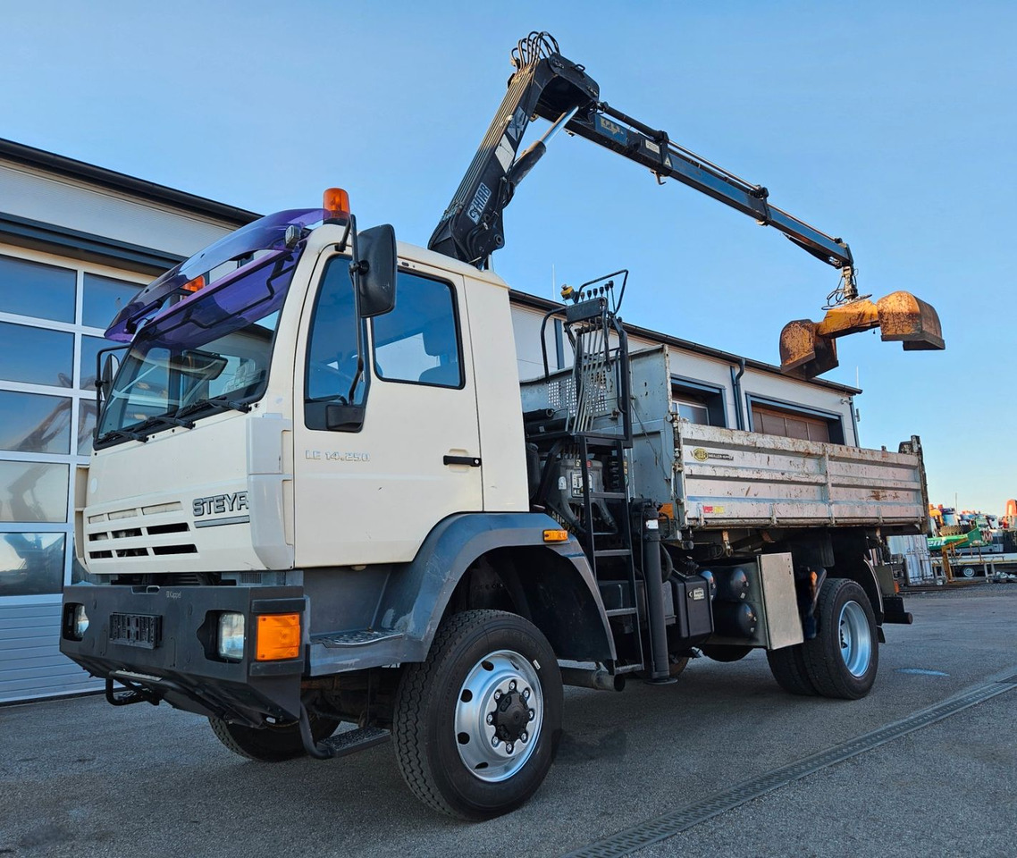 MAN LE 14.250 4x4 HIAB 077BS-2 Kran Greifer - Camión volquete, Camión grúa: foto 1 MAN LE 14.250 4x4 HIAB 077BS-2 Kran Greifer - Camión volquete, Camión grúa: foto 1