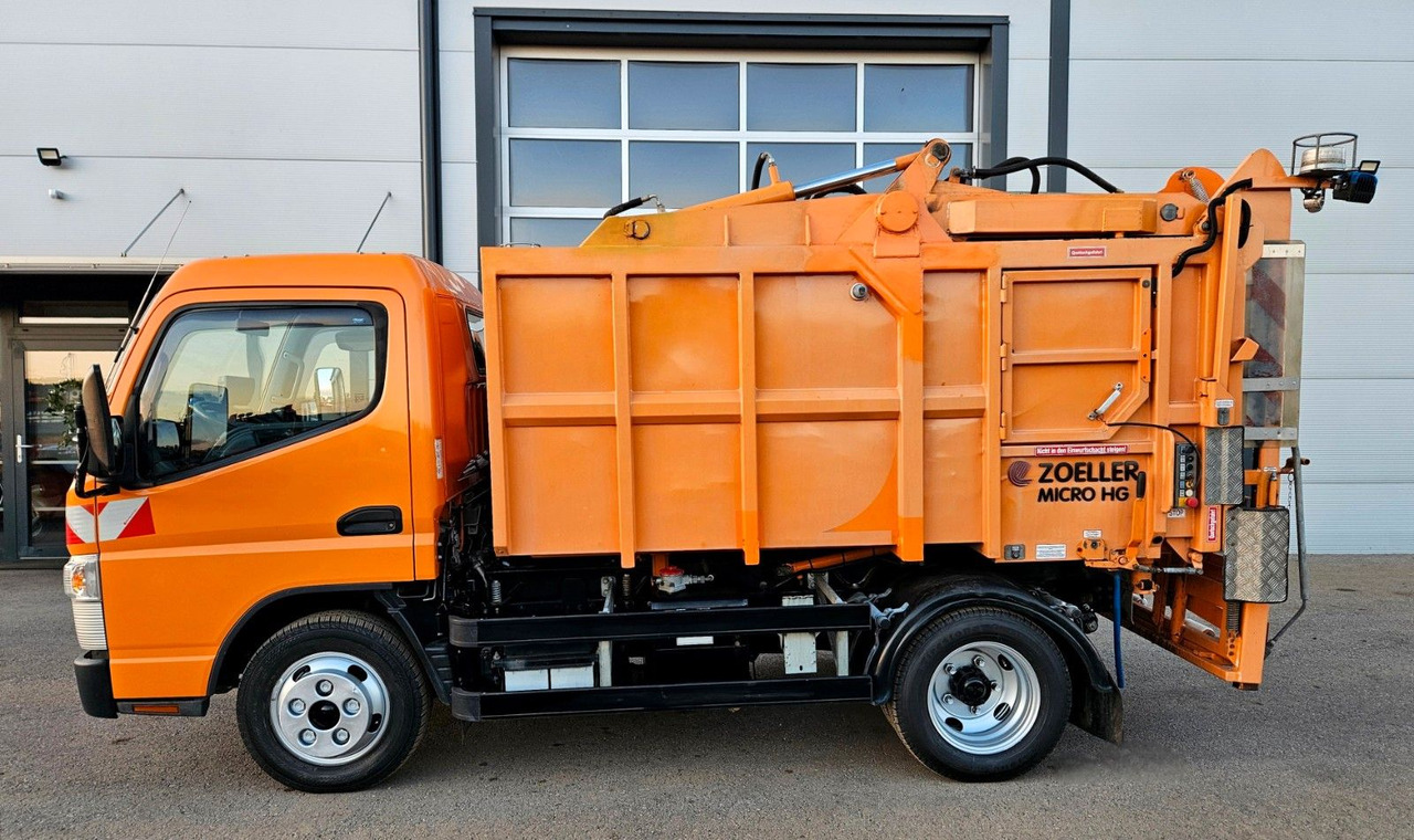 Mitsubishi Fuso Canter 6S15 Zoeller Micro Müllpresse - Camión de basura: foto 2 Mitsubishi Fuso Canter 6S15 Zoeller Micro Müllpresse - Camión de basura: foto 2