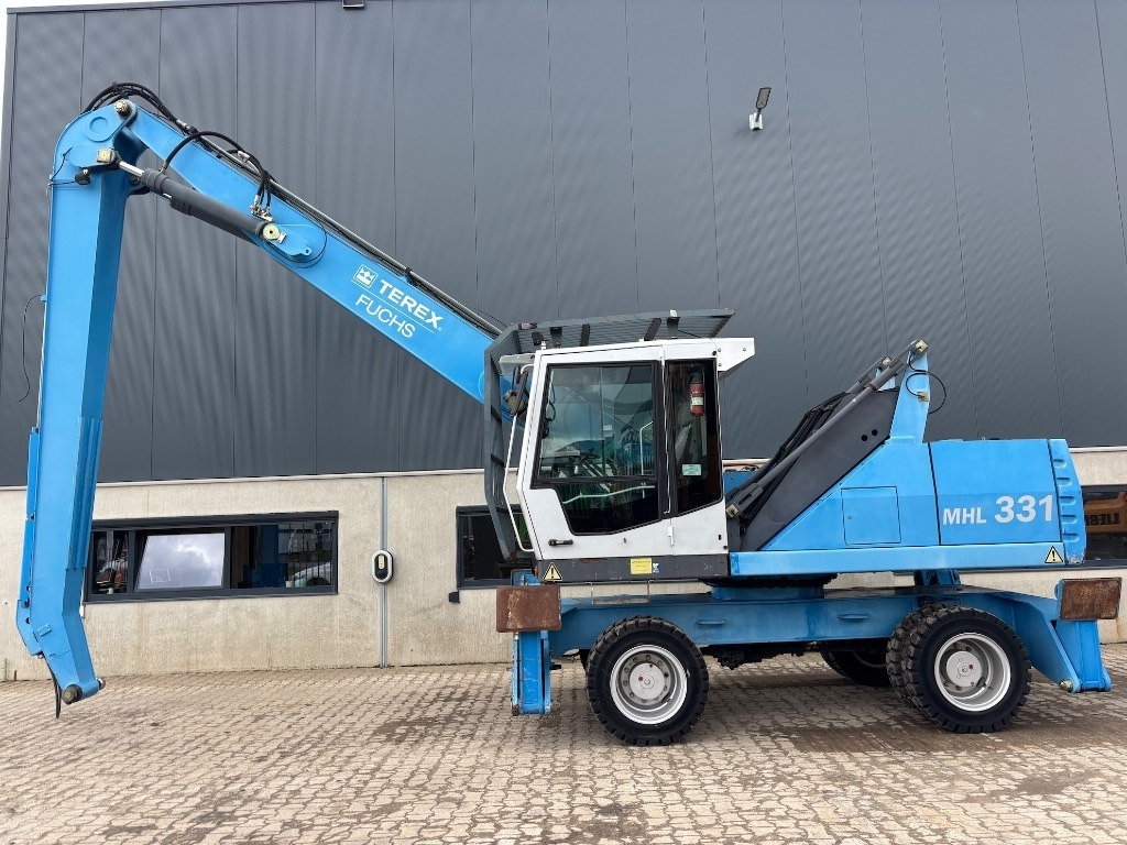 Fuchs MHL 331 D - MHL 335 - MHL 340 - Manipulador de materiales: foto 4 Fuchs MHL 331 D - MHL 335 - MHL 340 - Manipulador de materiales: foto 4