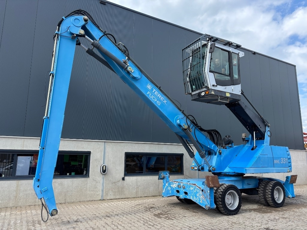 Fuchs MHL 331 D - MHL 335 - MHL 340 - Manipulador de materiales: foto 1 Fuchs MHL 331 D - MHL 335 - MHL 340 - Manipulador de materiales: foto 1