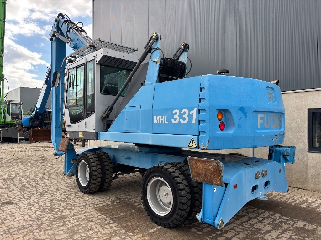 Fuchs MHL 331 D - MHL 335 - MHL 340 - Manipulador de materiales: foto 5 Fuchs MHL 331 D - MHL 335 - MHL 340 - Manipulador de materiales: foto 5