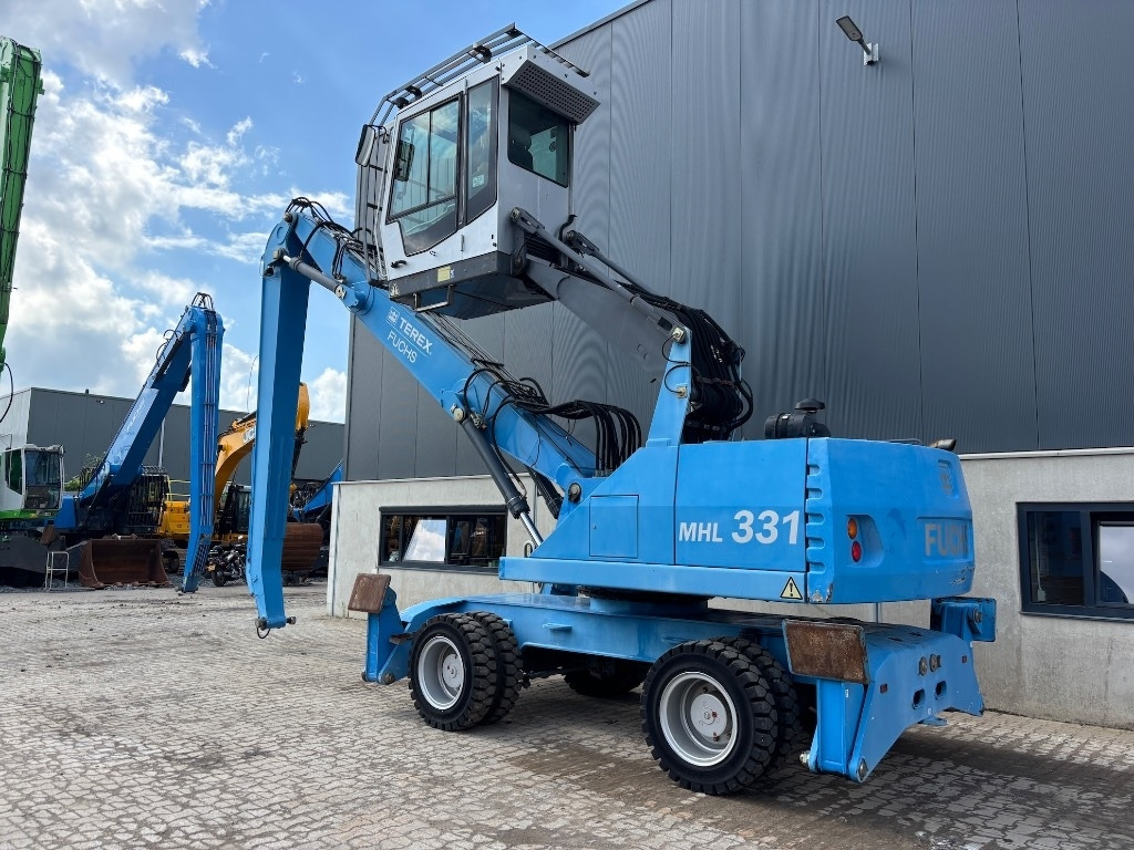 Fuchs MHL 331 D - MHL 335 - MHL 340 - Manipulador de materiales: foto 2 Fuchs MHL 331 D - MHL 335 - MHL 340 - Manipulador de materiales: foto 2