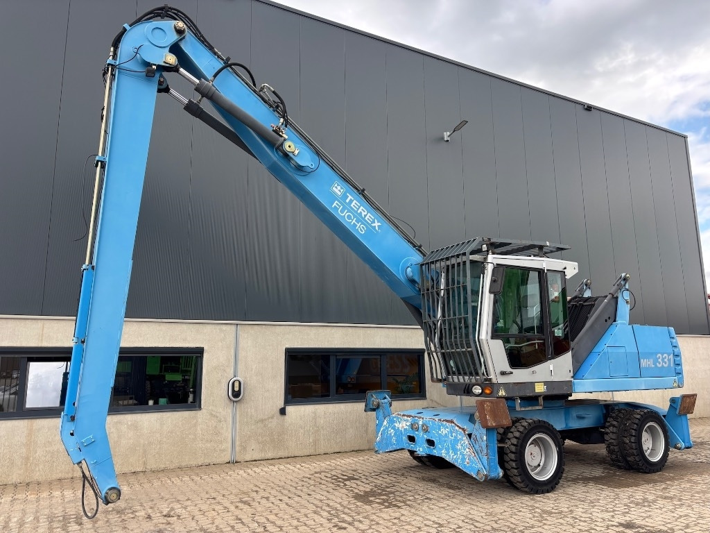 Fuchs MHL 331 D - MHL 335 - MHL 340 - Manipulador de materiales: foto 3 Fuchs MHL 331 D - MHL 335 - MHL 340 - Manipulador de materiales: foto 3