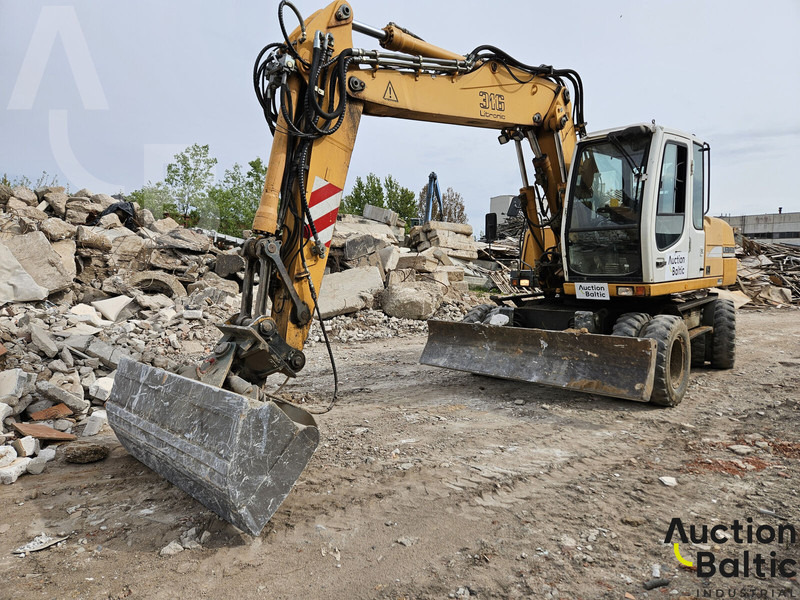 Liebherr A 316 Litronic - Excavadora de ruedas: foto 1 Liebherr A 316 Litronic - Excavadora de ruedas: foto 1