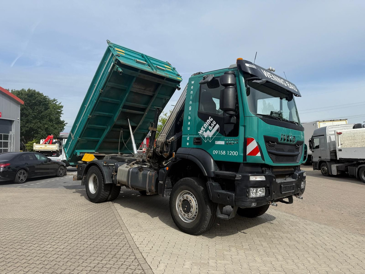 Iveco AD190 T/W Trakker 410 4x4 Allrad Kran KipperHIAB - Camión volquete, Camión grúa: foto 2 Iveco AD190 T/W Trakker 410 4x4 Allrad Kran KipperHIAB - Camión volquete, Camión grúa: foto 2