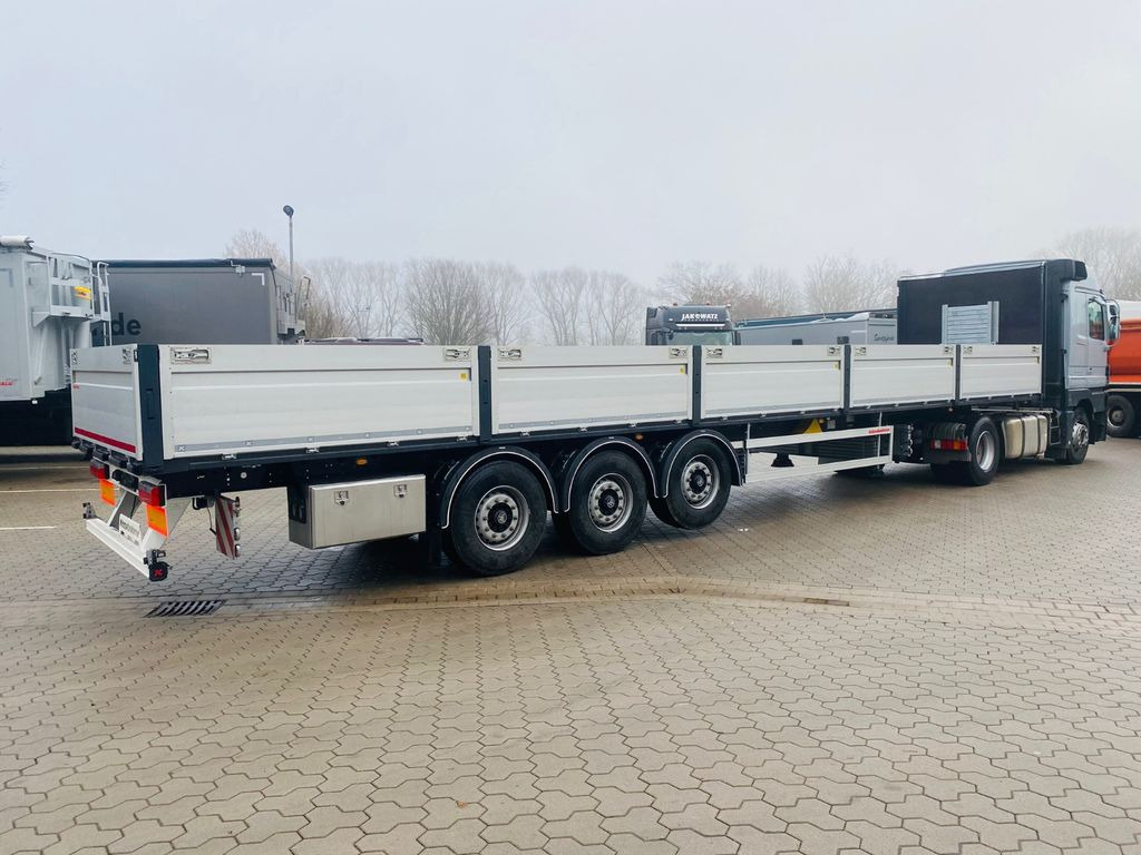 Kässbohrer Bordwandauflieger Twistlocks - Semirremolque plataforma/ Caja abierta: foto 4 Kässbohrer Bordwandauflieger Twistlocks - Semirremolque plataforma/ Caja abierta: foto 4
