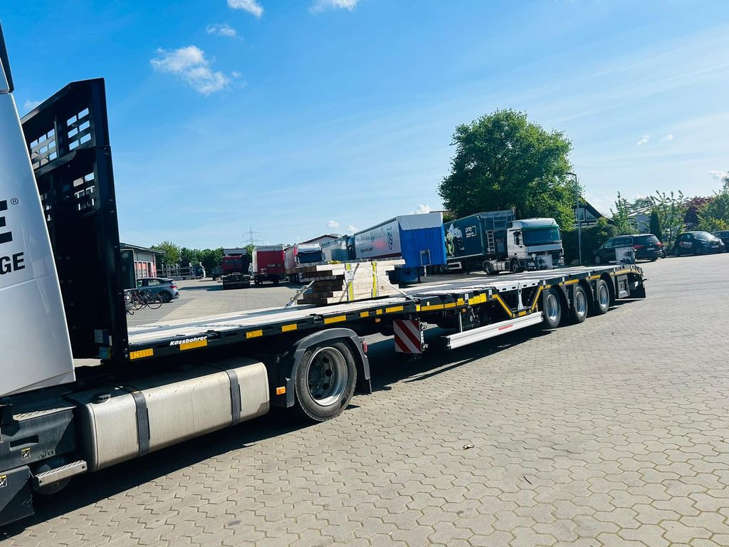 Kässbohrer Mega Tele HD Plattform Auflieger mit Radmulden - Semirremolque plataforma/ Caja abierta: foto 1 Kässbohrer Mega Tele HD Plattform Auflieger mit Radmulden - Semirremolque plataforma/ Caja abierta: foto 1