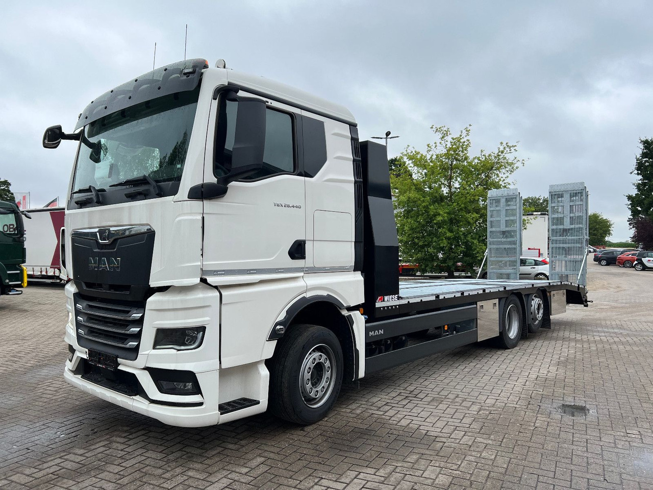 MAN Baumaschinen- Arbeitsbühnentransporter Rampen - Grua de remolque autos: foto 5 MAN Baumaschinen- Arbeitsbühnentransporter Rampen - Grua de remolque autos: foto 5