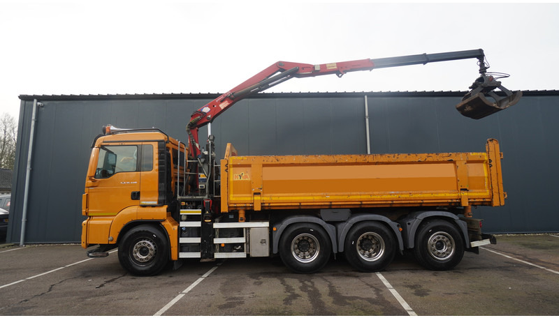 MAN TGS 35.440 8X4 2 SIDE TIPPER WITH HMF Z 1943 CRANE 415.000KM - Camión grúa: foto 2 MAN TGS 35.440 8X4 2 SIDE TIPPER WITH HMF Z 1943 CRANE 415.000KM - Camión grúa: foto 2
