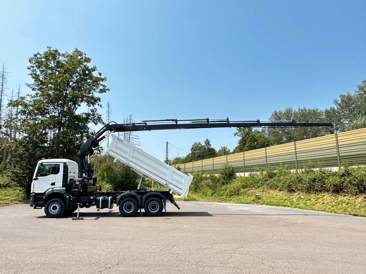 MAN TGS 33.440 6x4 /3-Seiten- Kipper / HIAB 228-6 - Camión volquete, Camión grúa: foto 4 MAN TGS 33.440 6x4 /3-Seiten- Kipper / HIAB 228-6 - Camión volquete, Camión grúa: foto 4