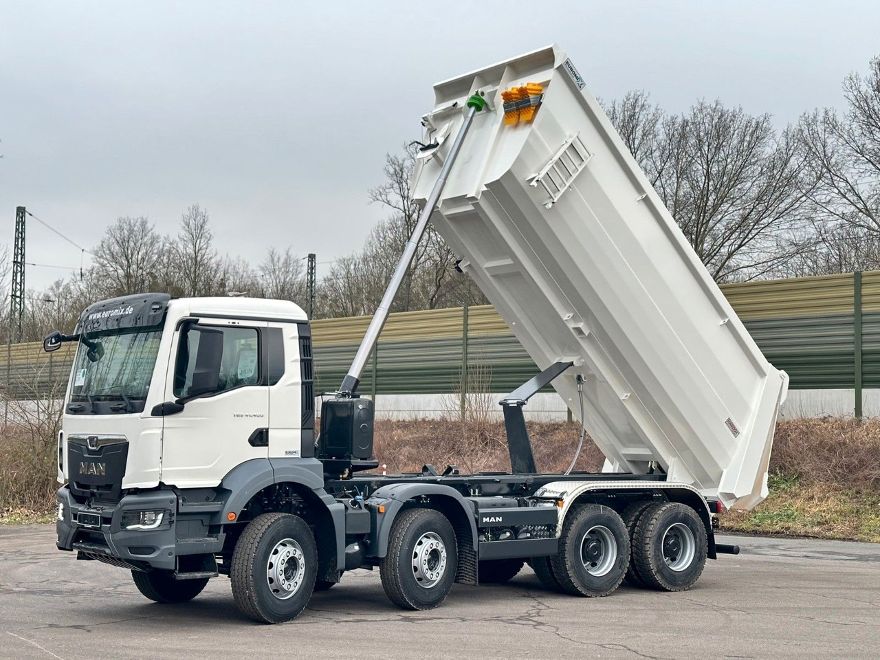 MAN TGS 41.400 8x4 / EUROMIX MTP 20m³/ EURO 5 - Camión volquete: foto 1 MAN TGS 41.400 8x4 / EUROMIX MTP 20m³/ EURO 5 - Camión volquete: foto 1