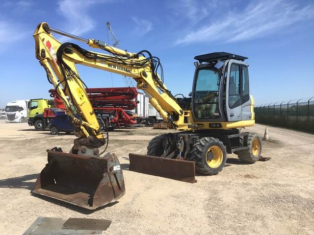 New Holland MH2.6 - Excavadora de ruedas: foto 1 New Holland MH2.6 - Excavadora de ruedas: foto 1