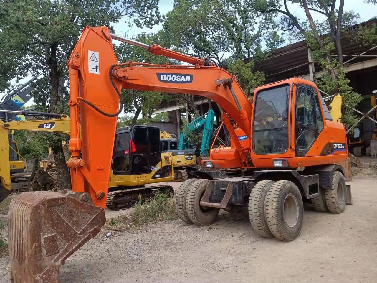 Doosan DH150W - Excavadora de ruedas: foto 2 Doosan DH150W - Excavadora de ruedas: foto 2