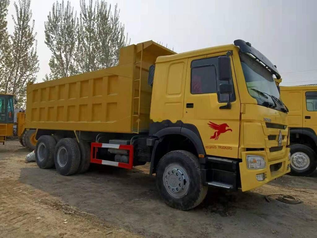 Sinotruk HOWO 6*4 Dump truck - Camión volquete: foto 1 Sinotruk HOWO 6*4 Dump truck - Camión volquete: foto 1