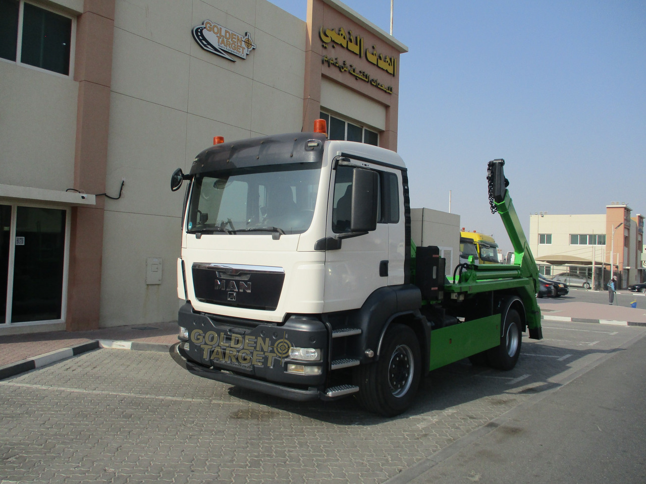 MAN TGS 18.440 4x2 Skip Loader - Camión portacontenedor de cadenas: foto 2 MAN TGS 18.440 4x2 Skip Loader - Camión portacontenedor de cadenas: foto 2