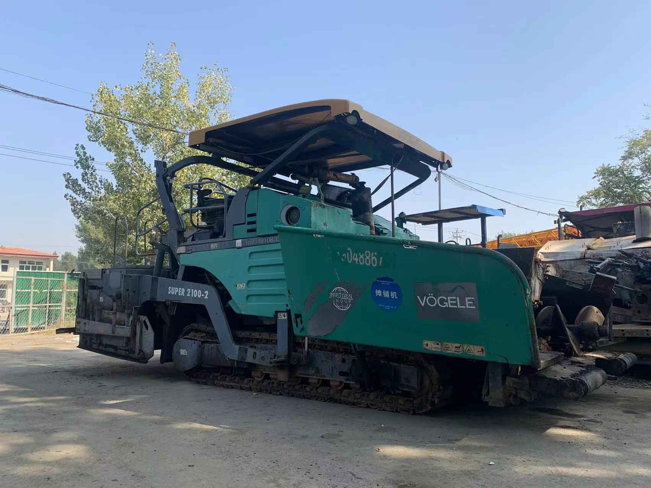VOGELE Asphalt Paver Super 2100-2, 2100-3 Good Price on Sale - Pavimentadora de asfalto: foto 1 VOGELE Asphalt Paver Super 2100-2, 2100-3 Good Price on Sale - Pavimentadora de asfalto: foto 1