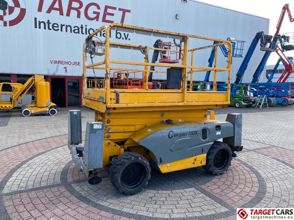 Haulotte Compact 12DX Diesel 4x4 Scissor Work Lift 1206cm - Plataforma de tijeras: foto 1 Haulotte Compact 12DX Diesel 4x4 Scissor Work Lift 1206cm - Plataforma de tijeras: foto 1