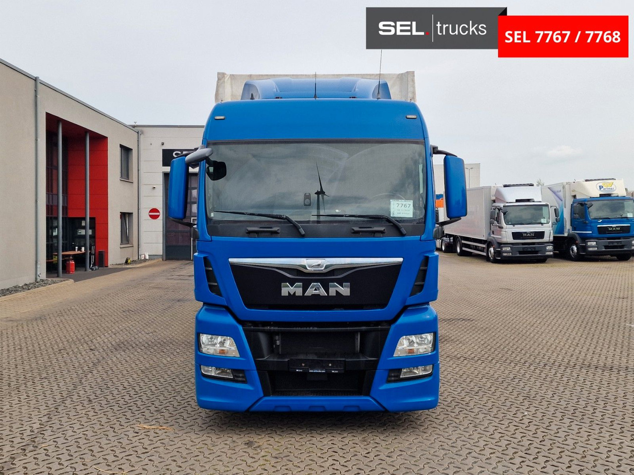 MAN TGX 18.440 4X2 LL-U /Intarder/Hubdach/Durchlade - Camión lona: foto 2 MAN TGX 18.440 4X2 LL-U /Intarder/Hubdach/Durchlade - Camión lona: foto 2