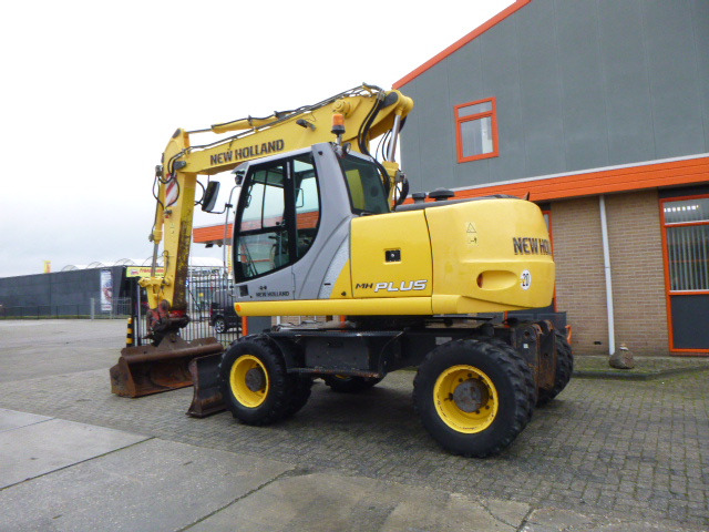 NEW HOLLAND MH PLUS - Excavadora de ruedas: foto 3 NEW HOLLAND MH PLUS - Excavadora de ruedas: foto 3