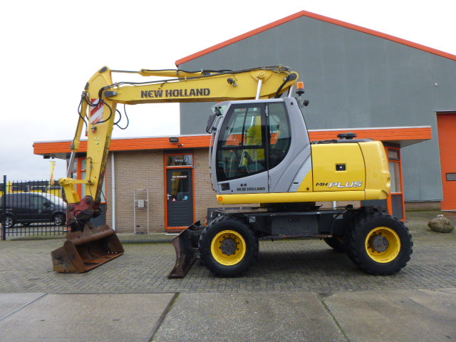 NEW HOLLAND MH PLUS - Excavadora de ruedas: foto 2 NEW HOLLAND MH PLUS - Excavadora de ruedas: foto 2