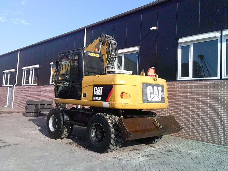 Caterpillar M315D - Excavadora de ruedas: foto 2 Caterpillar M315D - Excavadora de ruedas: foto 2