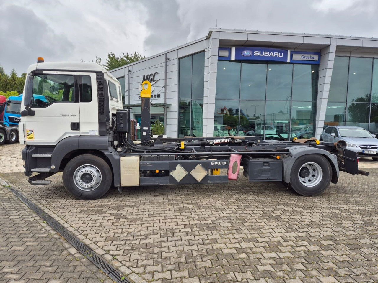 MAN TGS 18.320 Multilift UP TO 14 TON / NO Rust - Camión portacontenedore/ Intercambiable: foto 1 MAN TGS 18.320 Multilift UP TO 14 TON / NO Rust - Camión portacontenedore/ Intercambiable: foto 1