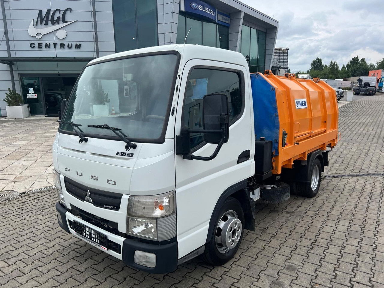 Mitsubishi Canter Fuso 3S13 AMT / Presscontainer / LOW KM / Super Condition - Camión de basura: foto 1 Mitsubishi Canter Fuso 3S13 AMT / Presscontainer / LOW KM / Super Condition - Camión de basura: foto 1
