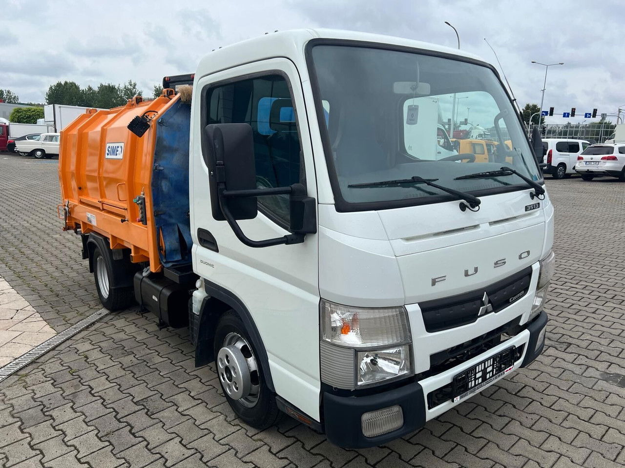 Mitsubishi Canter Fuso 3S13 AMT / Presscontainer / LOW KM / Super Condition - Camión de basura: foto 2 Mitsubishi Canter Fuso 3S13 AMT / Presscontainer / LOW KM / Super Condition - Camión de basura: foto 2