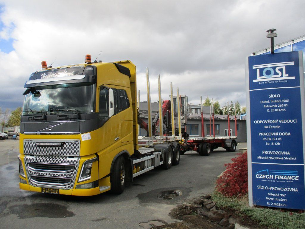 Volvo FH 16 750 6x4 + Fliegl - Camión forestal, Camión grúa: foto 1 Volvo FH 16 750 6x4 + Fliegl - Camión forestal, Camión grúa: foto 1