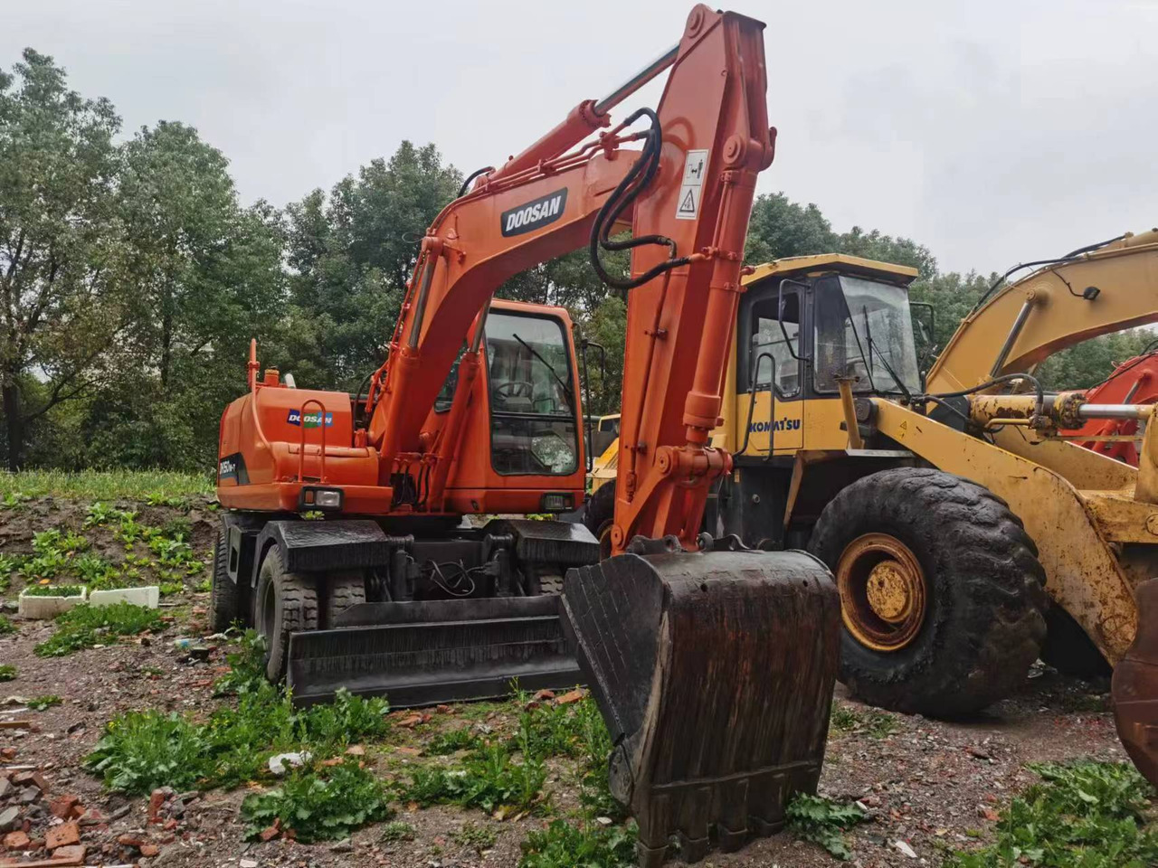 DOOSAN DH150W-7 - Excavadora de ruedas: foto 1 DOOSAN DH150W-7 - Excavadora de ruedas: foto 1