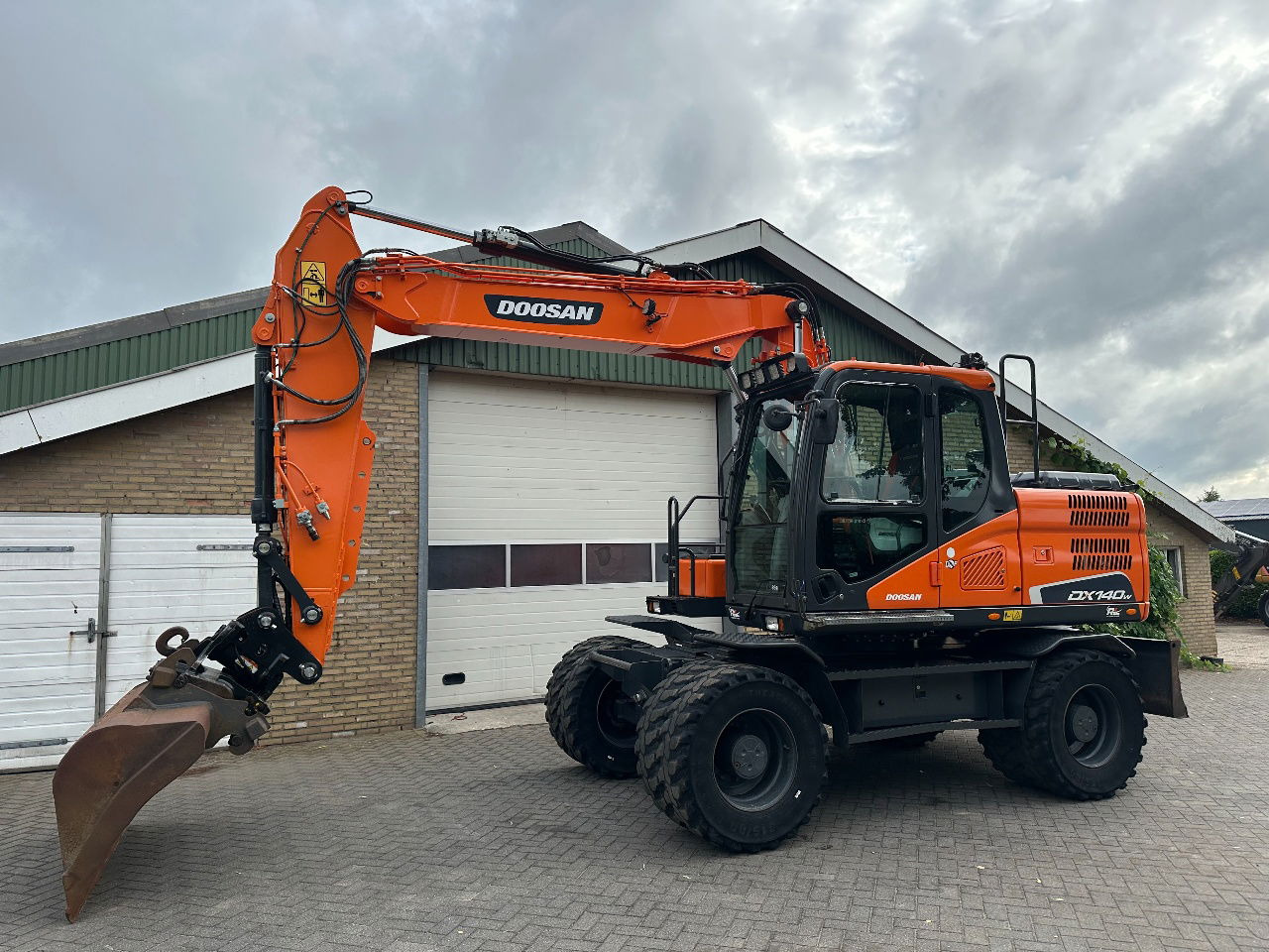 Doosan DX140W-5 - Excavadora de ruedas: foto 2 Doosan DX140W-5 - Excavadora de ruedas: foto 2