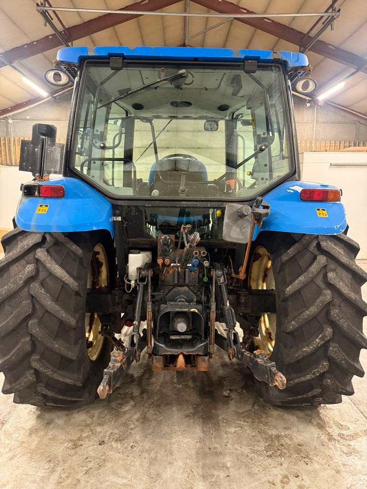 New Holland T5060 - Tractor: foto 4 New Holland T5060 - Tractor: foto 4