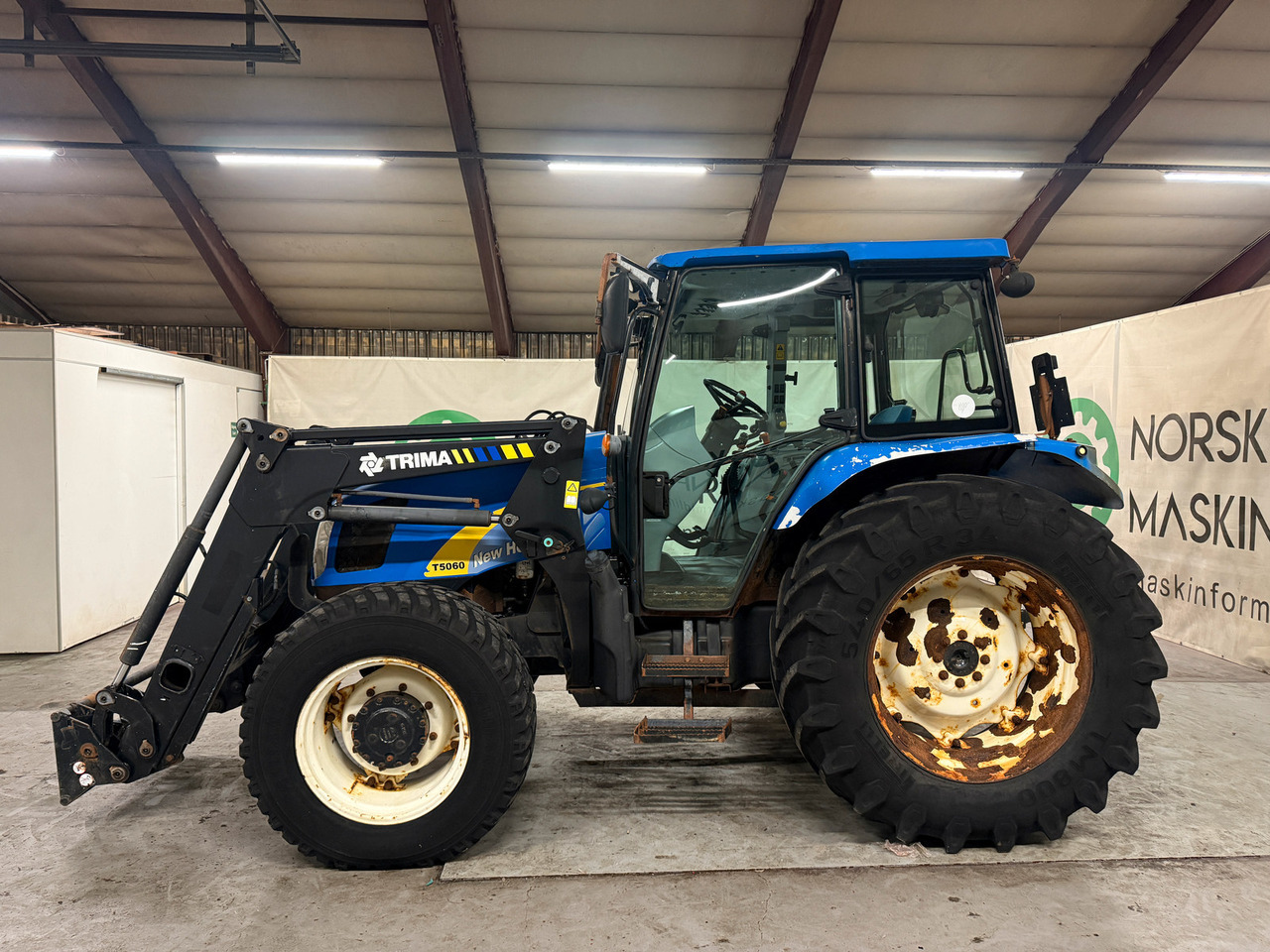 New Holland T5060 - Tractor: foto 2 New Holland T5060 - Tractor: foto 2
